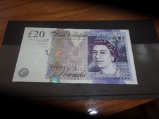 Old twenty pound note - £20,