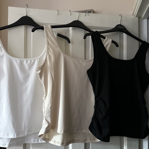 Three soft material vest tops - soft,