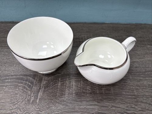 Wedgwood milk jug - and, sugar