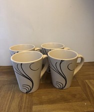4 CREAM COLOURED MUGS WITH A