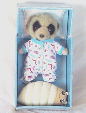 Compare the meerkat toy