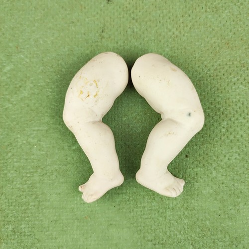 Antique dollhouse baby doll