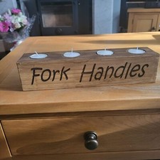Four Candles , fork Handles 