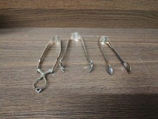Three EPNS Sugar Tongs 