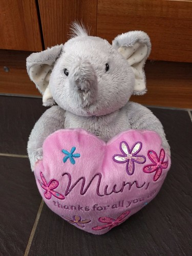 Elliot buttons holding mum - elliot,