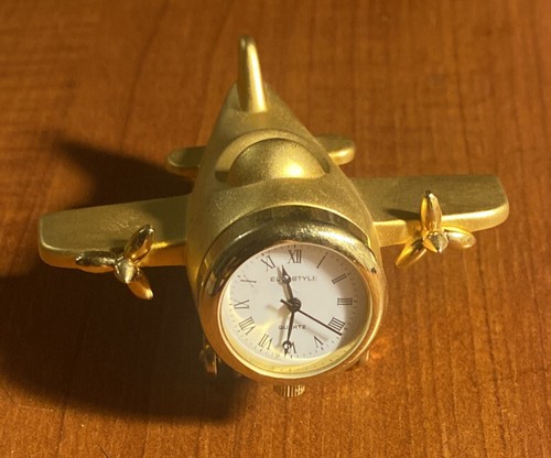 Golden metal table airplane - golden,