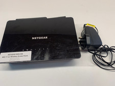 Netgear 802.11 ac wireless access point WAC104 and charger