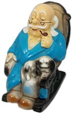Vintage Moneybox-Retirement Fund. Old Man in a Rocking Chair with Pekingese  Dog