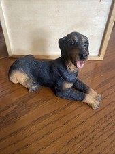 Doberman pinscher dog figure