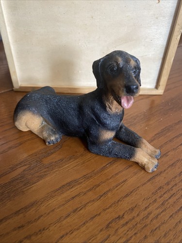 Doberman pinscher dog figure