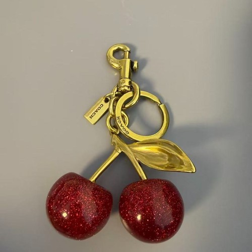 Coach red cherry bag charm - cherry,
