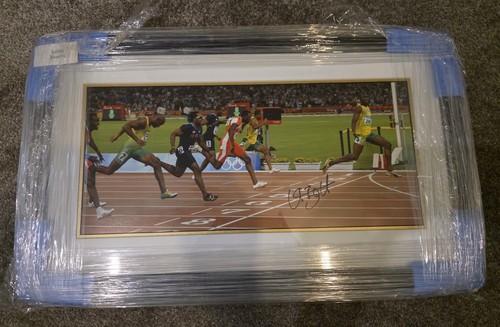 Usain bolt signed photo with - usain,