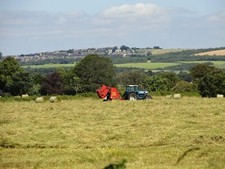 Photo 6x4 Baling hay In a