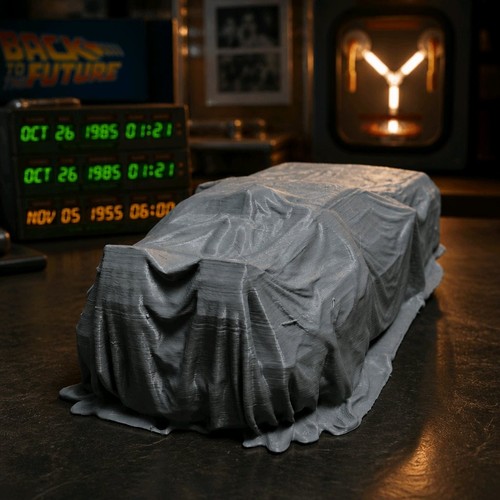 Covered delorean car ornament - covered,