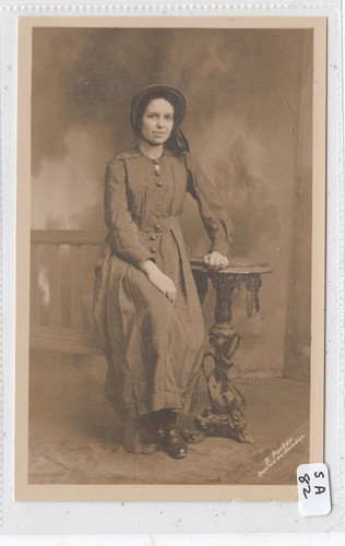Postcard lady seated - postcard,