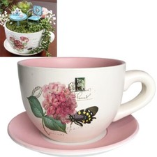 TEA CUP AND SAUCER SHAPED