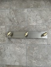 Antique brass style ceiling triple adjustable GU10 spot lights.