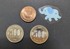Two types of Japanese 500 yen coins (2001 & 2025), and one 10 yen coin (2025)