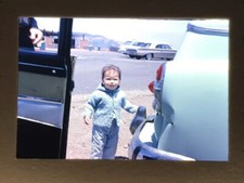 1960 small child next to - small,