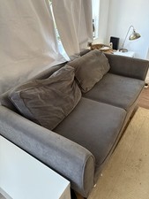Two Grey Sofas with Cushions