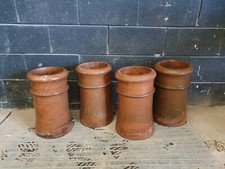 SET OF 4 CLAY CANNON POTS/
