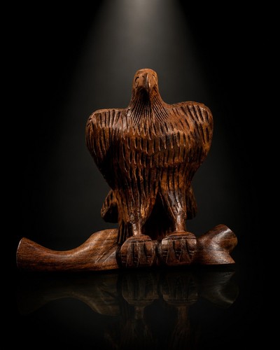 Hand carved wooden falcon - hand,