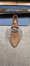 just the right shoe "teetering