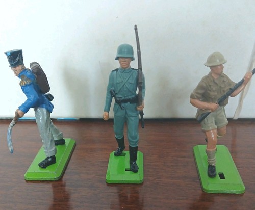 Three vintage britains - three,