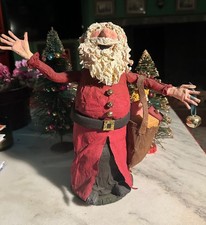 Whimsical, Connecticut, handmade paper mache Santa with bag of toys