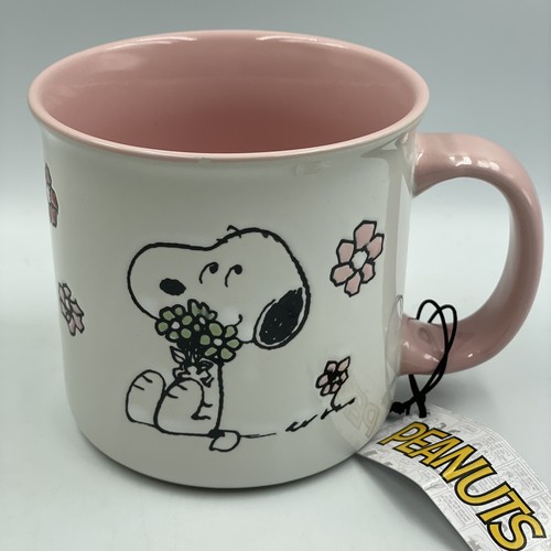 Snoopy sitting with flowers - snoopy,