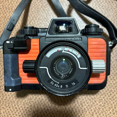 Nikon 35mm v - f/2.5,