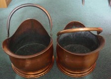 2 Copper coal/fuel Scuttles marked C Bros. Well used and ready for more use!