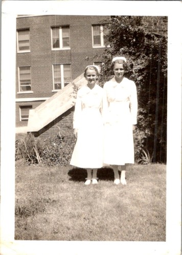 Two young nurses white - young,