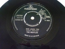 The Beatles - SHE LOVES YOU /