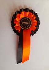 Winner orange and black