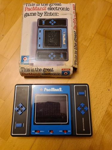 Entex pacman hand held - hand,