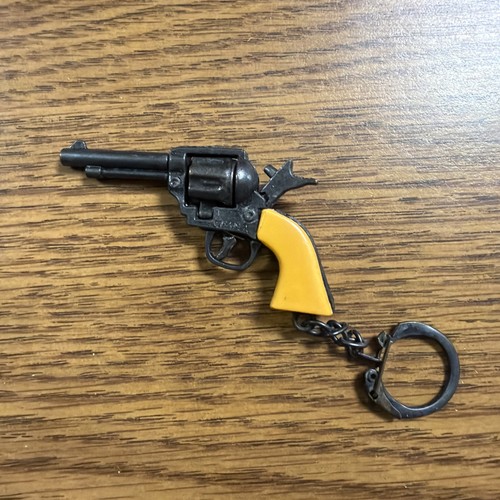 Keychain vintage capgun - ,