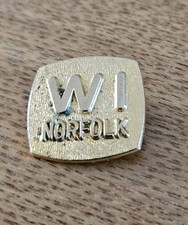 Golden Coloured Norfolk WI Badge