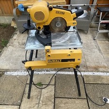 DEWALT DW743 240v Flip over - 250mm blade GWO