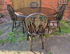 Dark Oak Oval Drop Leaf Dining
