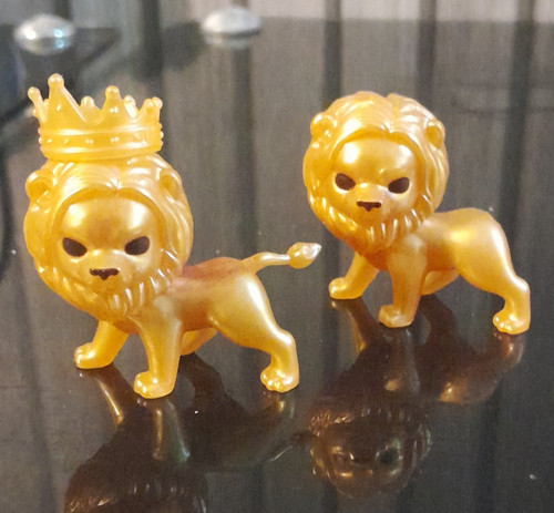 Gold lion plastic ornament - plastic,