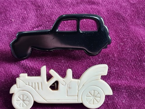 Two art deco bakelite brooch - art,
