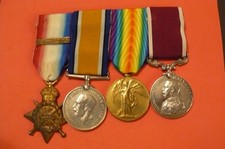 1914 Star medal trio. Original Aug-Nov clasp, GV L.S.G.C. 6 Dgn. Gds/The Royals
