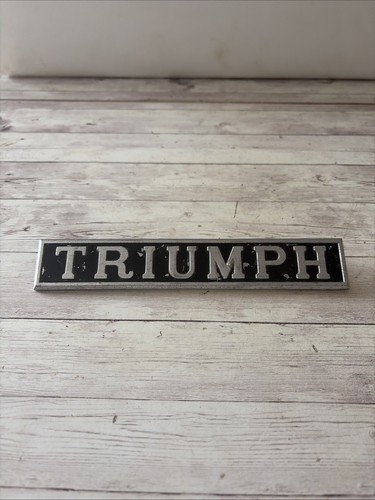 Triumph car badge fray - car,