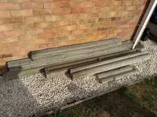 Concrete Slotted Fence Posts + Gravel Boards.