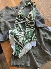 John Lewis Green swimming