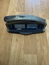 Staples One-Touch 3 Hole Punch. 