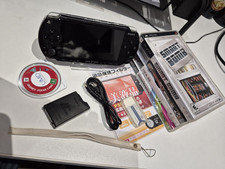 Sony PSP 1000 + 4 games + 1
