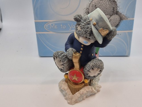 You bear figurine - to,