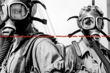 F007690 Girls wear oxygen masks US Steel Corp WW2